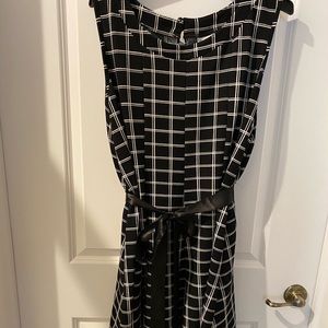 Skater dress with ribbon belt tie.